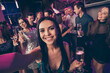 © deagreez - Self photo portrait of girl at party drinking champagne