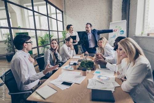 Photo of business people diversity colleagues boss guy scolding managers year budget fail company devastation crisis staff reduction unhappy show terrified workers way out office indoors