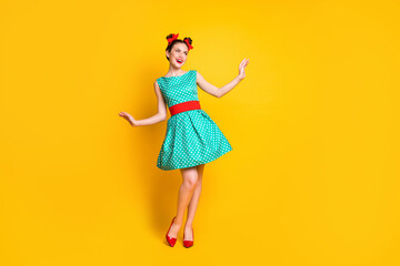 Poster - Full length body size view of nice charming cheerful girl wearing teal dress dancing posing isolated over bright yellow color background