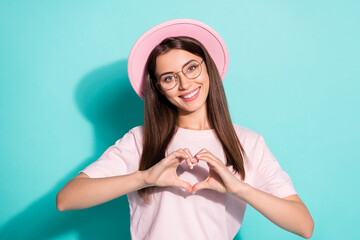 Canvas Print - Photo of positive cheerful young lady make fingers heart show endless love symbol isolated on turquoise color background