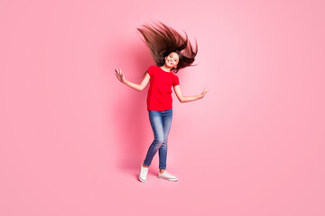 Poster - Full length photo of cheerful kid girl her hairstyle blowing by wind wear casual style clothes isolated over pink color background