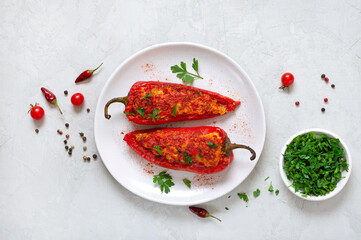 Wall Mural - Tasty peppers stuffed with chicken, lentils and tomatoes. Simple and useful dish. The top view