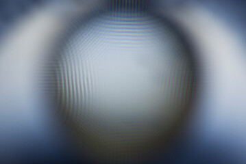 Wall Mural - A real photo of an abstract blurry object. An abstract blurry silhouette of a round object.