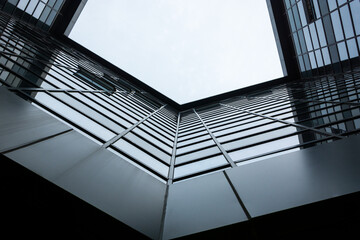 Wall Mural - Looking up at a modern office building