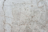 Fototapeta Desenie - old texture of white gray whitewash street wall in cracks abstract vintage background