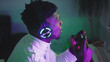 © CameraCraft - Portrait of happy black man playing game using video game console controlling joystick and winning. High quality photo
