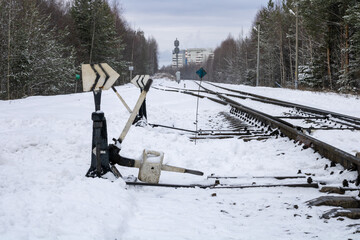 Wall Mural - Railway in winter. Snow-covered railway tracks.