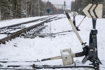 Wall Mural - Railway in winter. Snow-covered railway tracks.