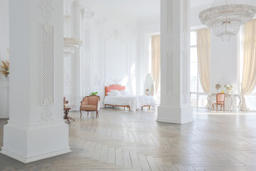 royal baroque style luxury posh interior of large room. extra white, full of day light. high ceiling and walls decorated by stucco