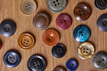 Poster - Background and texture of multicolored antique buttons