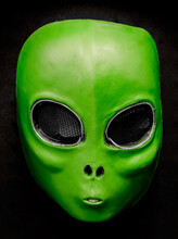 El Wire Alien Face Mask Isolated Against Black Background