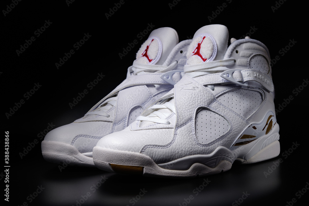 Nike Air Jordan 8 Retro OVO Drake White colorway sneakers on black
