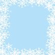 © Albachiaraa - Beautiful snowflakes frame on a blue winter christmas marketing vector background.