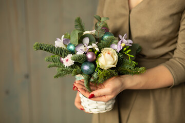 Wall Mural - Christmas bouquet of fir and roses for a gift and a holiday
