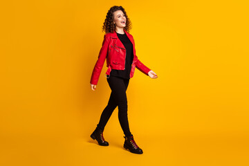 Canvas Print - Full length body size view of her she nice pretty cheerful wavy-haired girl strolling going isolated on bright yellow color background