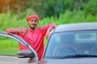 © PRASANNAPIX - young indian farmer with new car