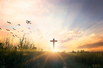 Wall Mural - good friday concept: cross on sunset sky background