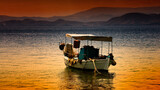 Fototapeta  - boat at sunset