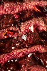 Wall Mural - Close up of grilled Medium Rare Ribeye steak with salt cristals