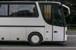 © Yuri Bizgaimer - bus is moving down the street in the city