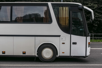 Canvas Print - bus is moving down the street in the city