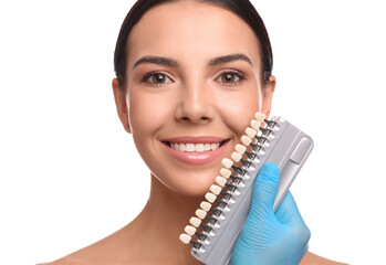 Poster - Doctor checking young woman's teeth color on white background. Cosmetic dentistry