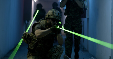 Wall Mural - SWAT team examining dark hallway