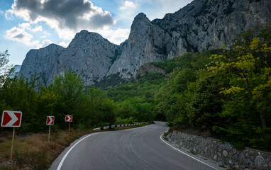 asphalted road in the mountains, beautiful sunshine, summer vacation time