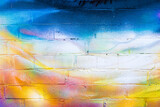 Fototapeta Fototapety dla młodzieży do pokoju - A fragment of colorful graffiti painted on a brick wall. Abstract backdrop for design.