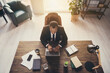 © deagreez - Top above high angle view of his he nice attractive classy chic skilled experienced guy copywriter ceo boss chief executive director sitting in chair writing article review at work place station