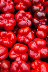 Wall Mural - natural ripe red peppers background