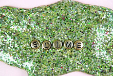 Green Glitter Slime And Golden Letters  Slime, Partial Blur     