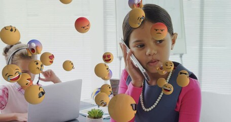 Wall Mural - multiple face emojis floating against girl talking on smartphone