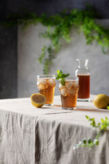 Wall Mural - Cold summer tea with lemon and mint