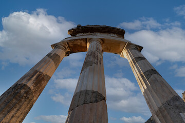 Wall Mural - The Athena temple complex, including the Delphic Tholos, Archeological site of Delphi, Greece