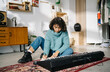 © Javier D√≠ez/Stocksy - Teenager choosing composition for playing synthesizer at home