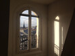 © Song about summer/Stocksy - window in Paris, typical apartment interior in old historical building, France