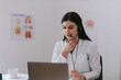© Oleksii Syrotkin/Stocksy - Doctor having session remotely