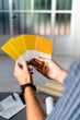 © Giorgio Fochesato/Westend61 - Architect holding color swatch while standing at office