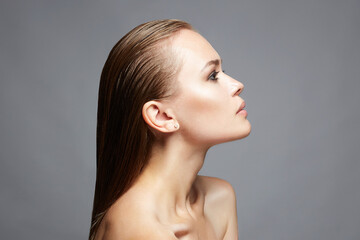 Wall Mural - beautiful girl with wet hair. beauty portrait