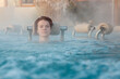 whirlpool with a young attractive relaxing woman