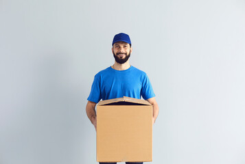 Wall Mural - Happy male courier smiling for camera