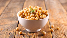 Bowl Of Chickpea On Wood Background