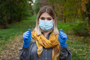 Poster - Woman with mask in the park