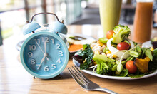 Selective Focus With Blue Clock Breakfast Time And Intermittent Fasting ,Lifestyle Concept.