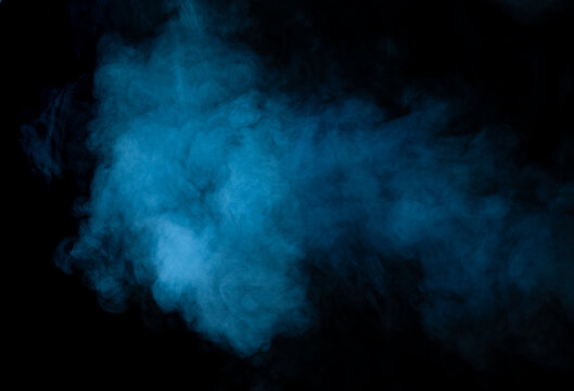 Fototapete - Texture of blue smoke on a black background