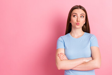 Sticker - Photo portrait of pouting woman with folded arms looking at blank space isolated on pastel pink colored background