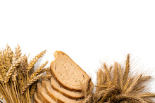 Loaf Bread. Rye Bakery With Crusty Loaves And Crumbs. Fresh Loaf Of Rustic Traditional Bread With Wheat Grain Ear Or Spike Plant Isolated On White Background. Bio Ingredients, Very Healthy Seeds.