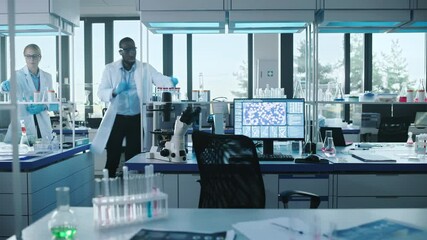 Wall Mural - moving dolly time-lapse: medical laboratory with diverse team of professional scientists talking, wo
