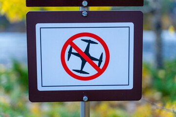 Public sign with no drones allowed symbol. Flying with unmanned drones is not allowed in this area.